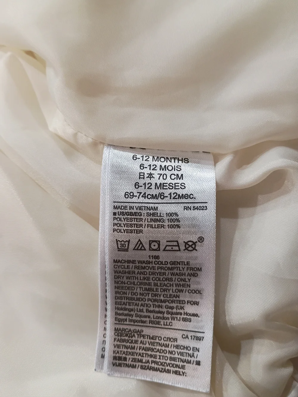 baby GAP Cream Puffer Vest with Bow